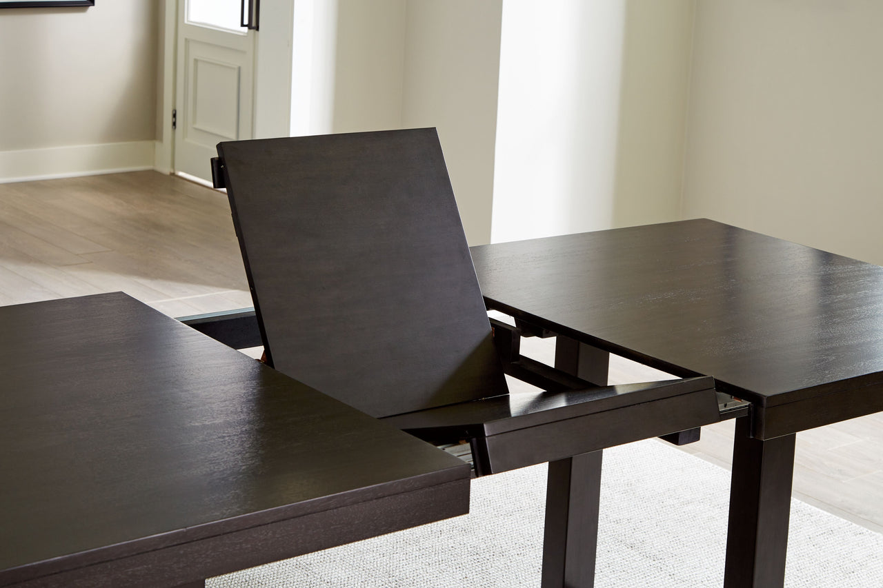 Neymorton - Dark Grayish Brown - Rectangular Dining Room Butterfly Extension Table - Tony's Home Furnishings