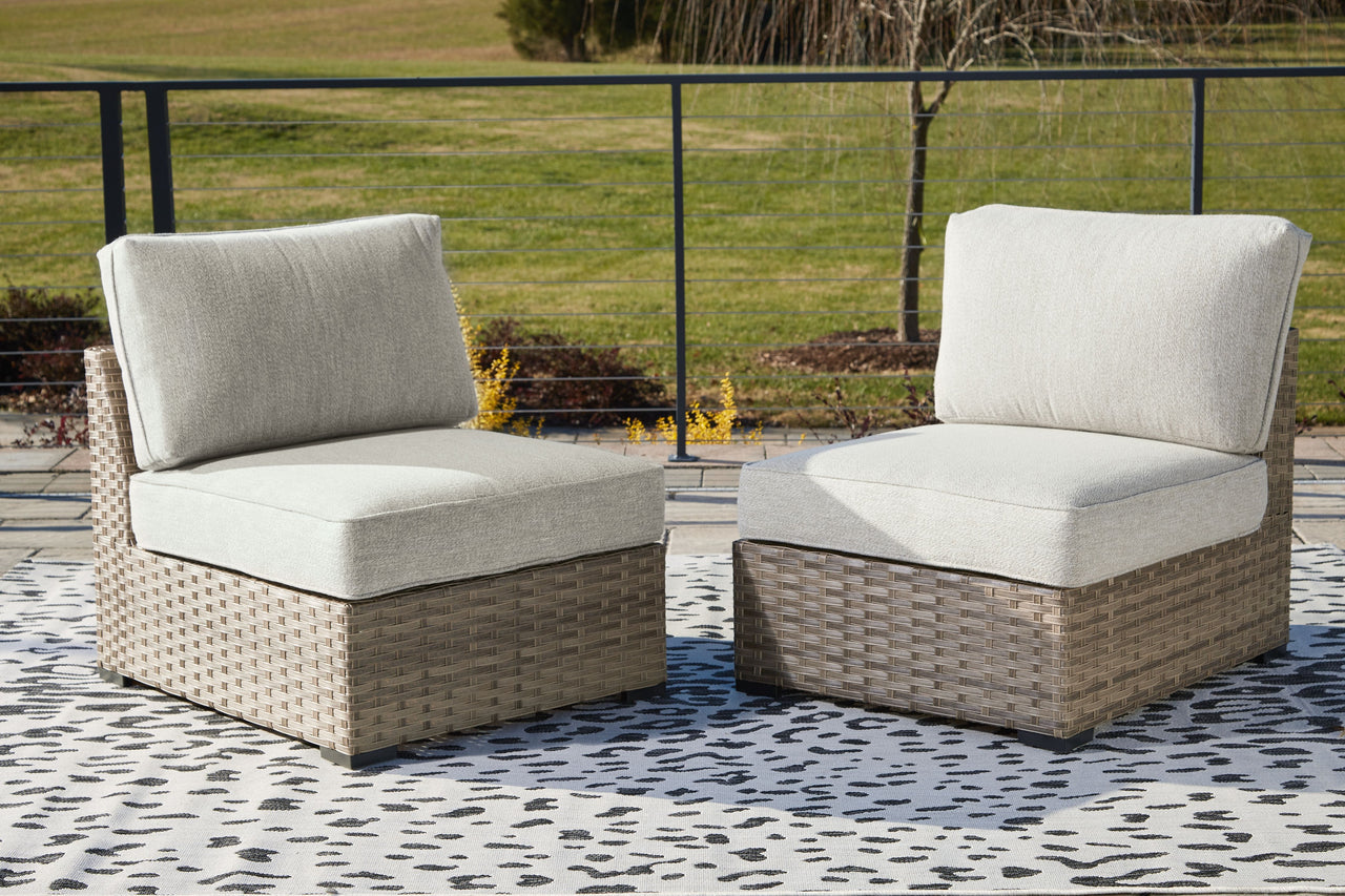 Calworth - Beige - Armless Chair W/Cushion (Set of 2) Ashley Furniture 