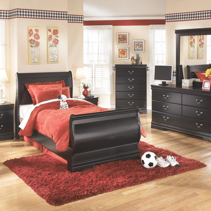 Huey - Black - Five Drawer Chest Ashley Furniture 