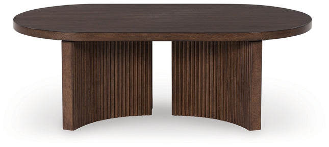 Korestone - Dark Brown - Oval Cocktail Table Signature Design by Ashley® 