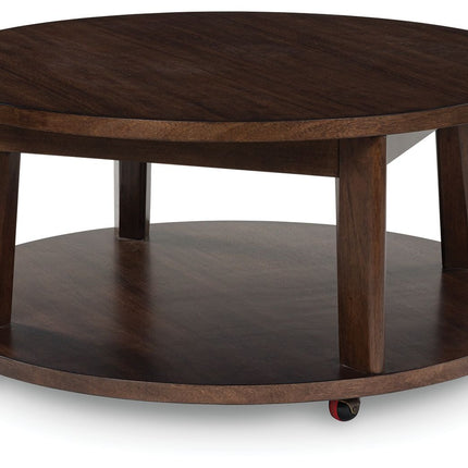 Korestone 2 - Dark Brown - Round Cocktail Table Signature Design by Ashley® 