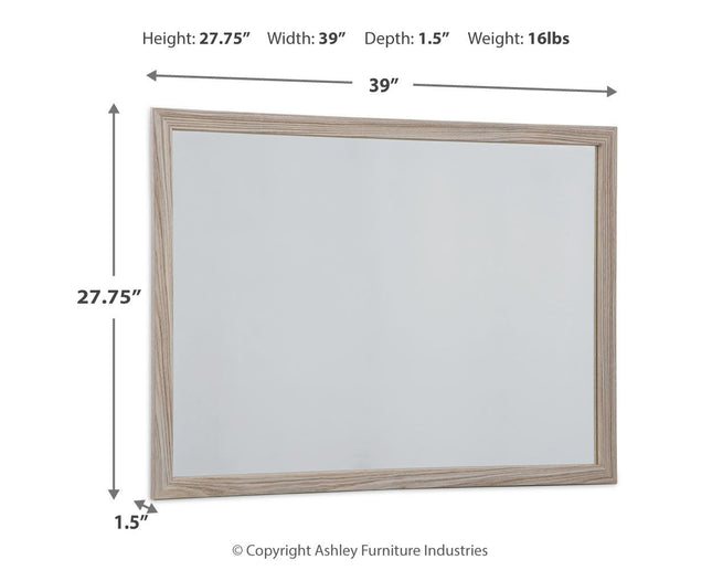 Hasbrick - Tan - Bedroom Mirror - Tony's Home Furnishings