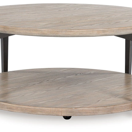 Dyonton - Light Grayish Brown - Round Cocktail Table Signature Design by Ashley® 