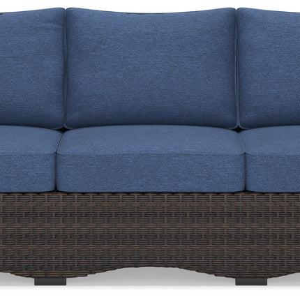 Windglow - Blue / Brown - Sofa With Cushion Signature Design by Ashley® 