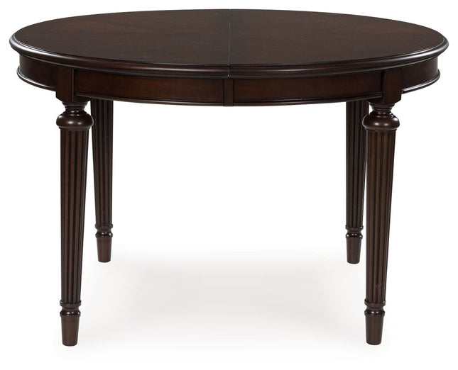 Lavinton - Brown - Oval Dining Room Extension Table Signature Design by Ashley® 