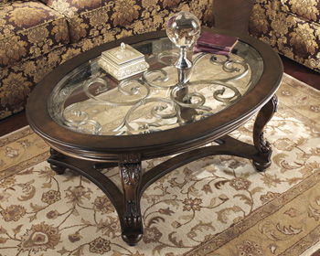 Norcastle - Dark Brown - Oval Cocktail Table Ashley Furniture 