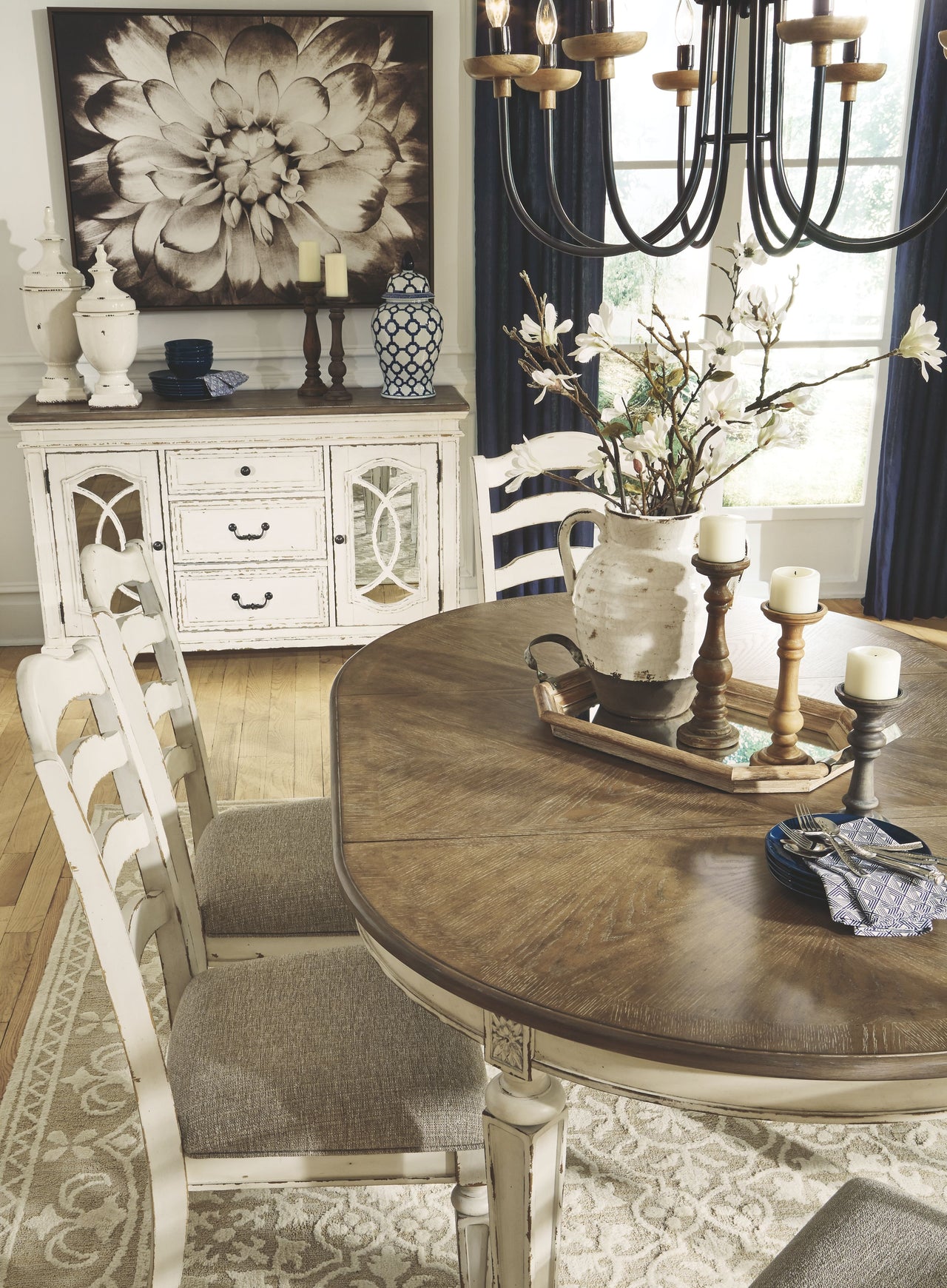 Realyn - Chipped White - Oval Dining Room Extension Table - Tony's Home Furnishings