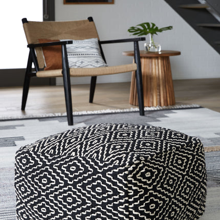 Jasett - Black / Ivory - Pouf Signature Design by Ashley® 