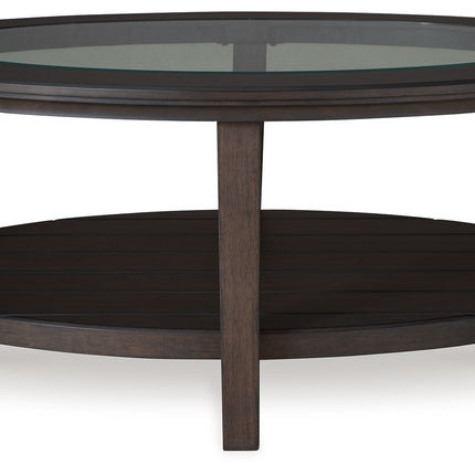 Celamar - Dark Brown - Oval Cocktail Table Signature Design by Ashley® 