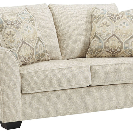 Haisley - Ivory - Loveseat Ashley Furniture 