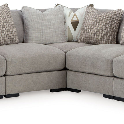 Aslan Court - Sectional With Ottoman Set Benchcraft® 