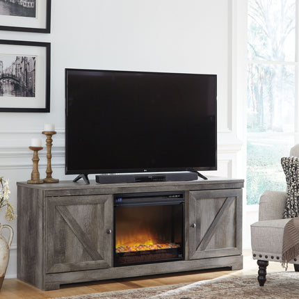 Wynnlow - Gray - 63" TV Stand With Glass/Stone Fireplace Insert Signature Design by Ashley® 