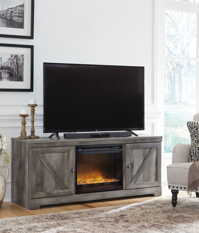 Wynnlow - Gray - 63" TV Stand With Glass/Stone Fireplace Insert Signature Design by Ashley® 