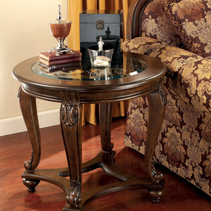 Norcastle - Dark Brown - Round End Table Ashley Furniture 