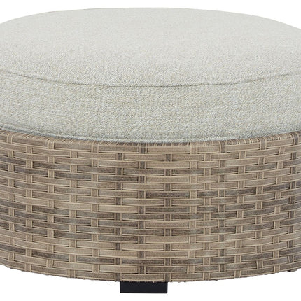 Calworth - Beige - Ottoman With Cushion Ashley Furniture 