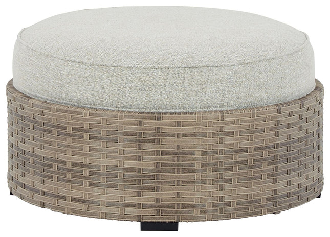 Calworth - Beige - Ottoman With Cushion Ashley Furniture 