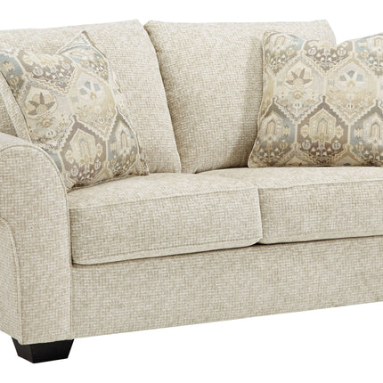 Haisley - Ivory - Loveseat Ashley Furniture 