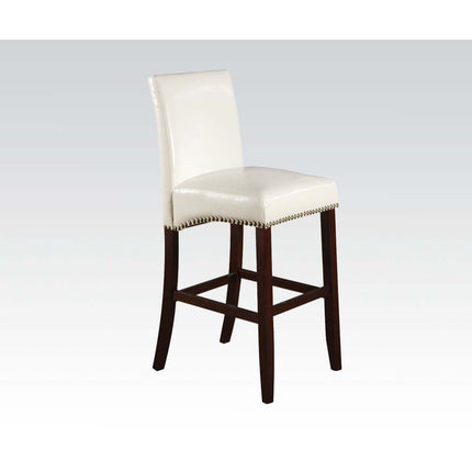 The Jakki sophisticated counter chair features crisp bycast leather and elegant nailhead trim details. The bycast leather seat and back with nailhead bottom accent trim will stand out as bold and stylish. Available in white and black. ACME 