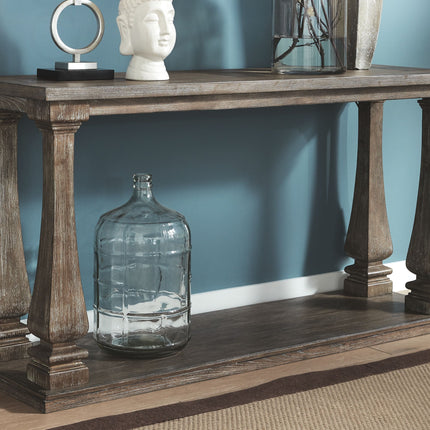 Johnelle - Gray - Sofa Table Signature Design by Ashley® 