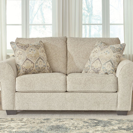 Haisley - Ivory - Loveseat Ashley Furniture 