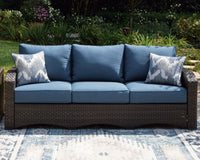 Windglow - Blue / Brown - Sofa With Cushion Signature Design by Ashley® 