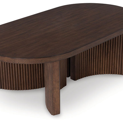 Korestone - Dark Brown - Oval Cocktail Table Signature Design by Ashley® 