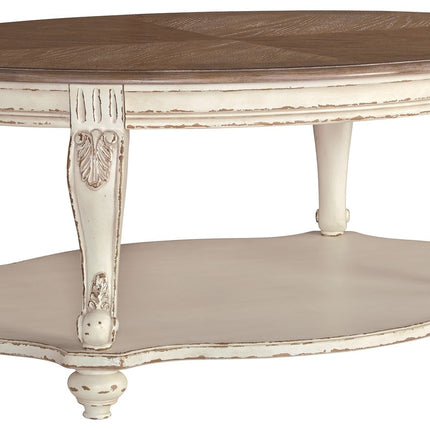 Realyn - White / Brown - Oval Cocktail Table Ashley Furniture 