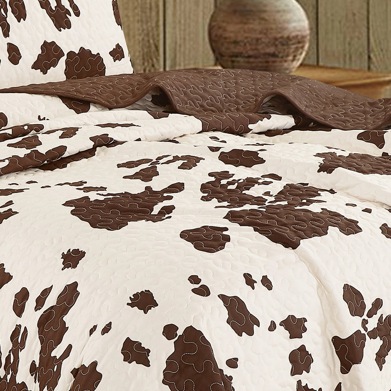 Rustic Cowhide Brown Bedspread Quilt - 3 Piece Set Tony's Home Furnishings Furniture. Beds. Dressers. Sofas.