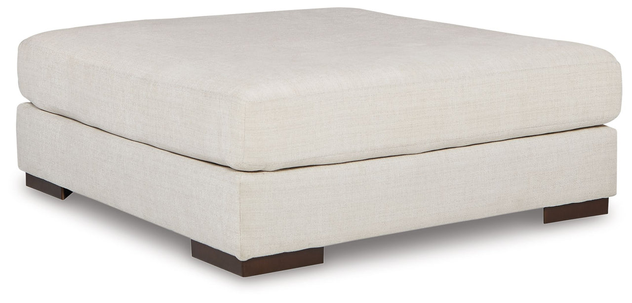 Lyndeboro - Natural - Oversized Accent Ottoman Tony's Home Furnishings Furniture. Beds. Dressers. Sofas.