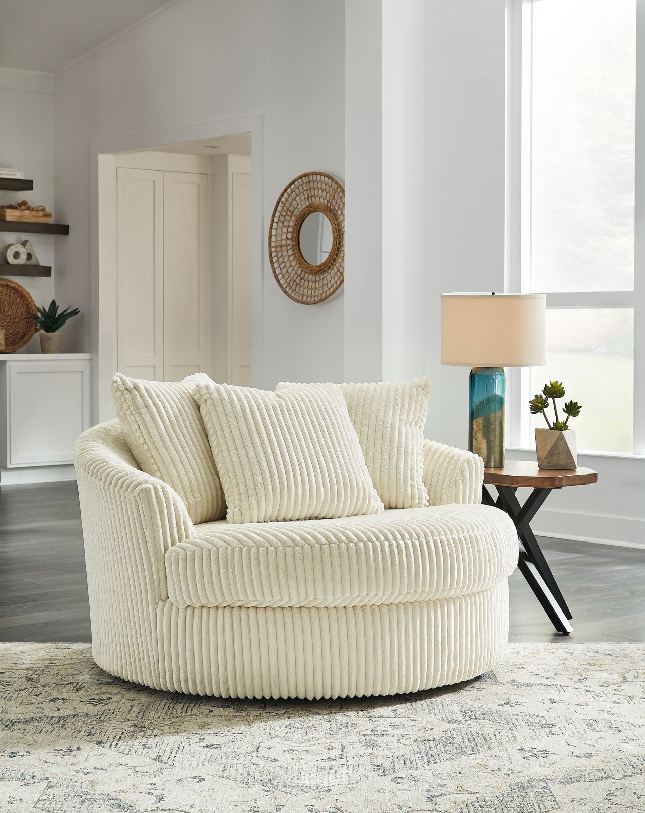 Lindyn - Oversized Swivel Accent Chair Tony's Home Furnishings Furniture. Beds. Dressers. Sofas.