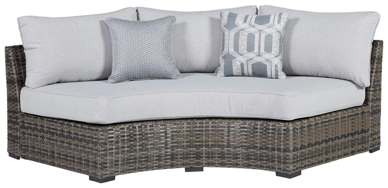 Harbor Court - Gray - Curved Loveseat With Cushion Tony's Home Furnishings Furniture. Beds. Dressers. Sofas.