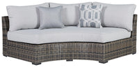 Thumbnail for Harbor Court - Gray - Curved Loveseat With Cushion Tony's Home Furnishings Furniture. Beds. Dressers. Sofas.