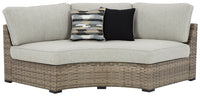 Thumbnail for Calworth - Beige - Curved Loveseat With Cushion Tony's Home Furnishings Furniture. Beds. Dressers. Sofas.