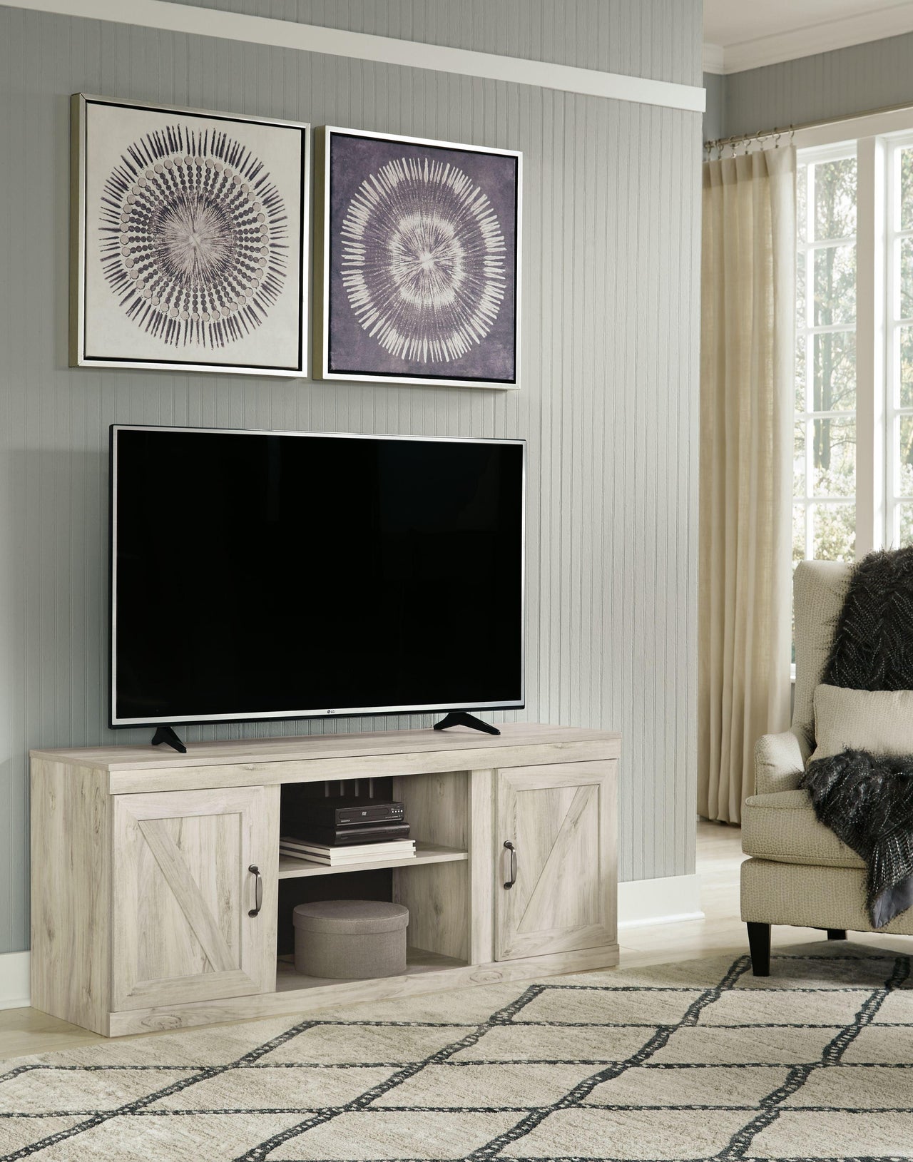 Bellaby - Whitewash - TV Stand With Faux Firebrick Fireplace Insert Tony's Home Furnishings Furniture. Beds. Dressers. Sofas.