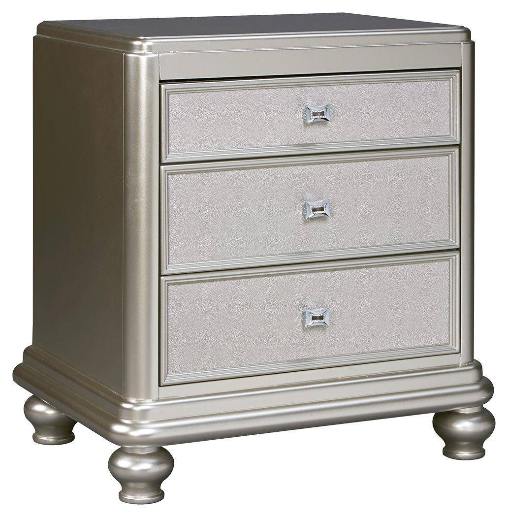 Coralayne - Silver - Three Drawer Night Stand Tony's Home Furnishings Furniture. Beds. Dressers. Sofas.