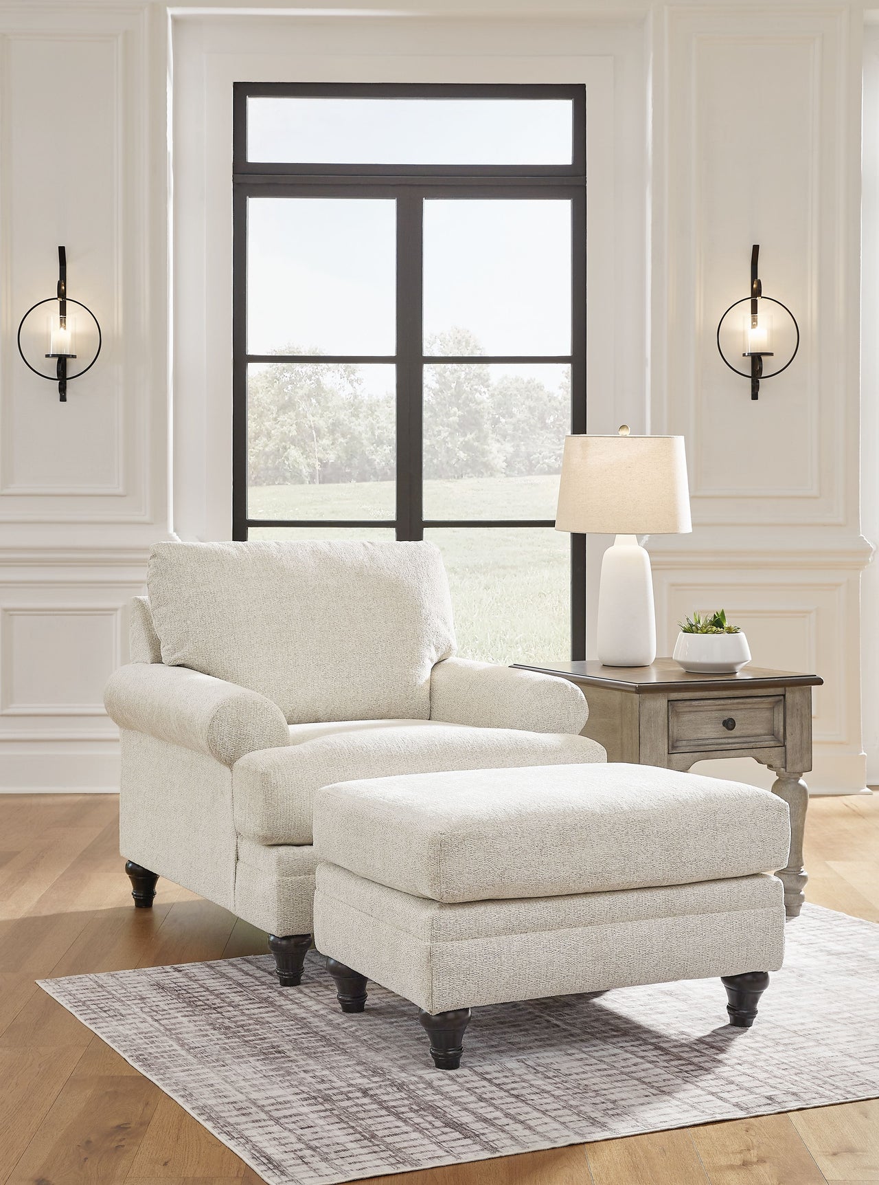Valerani - Sandstone - Chair, Ottoman Tony's Home Furnishings Furniture. Beds. Dressers. Sofas.