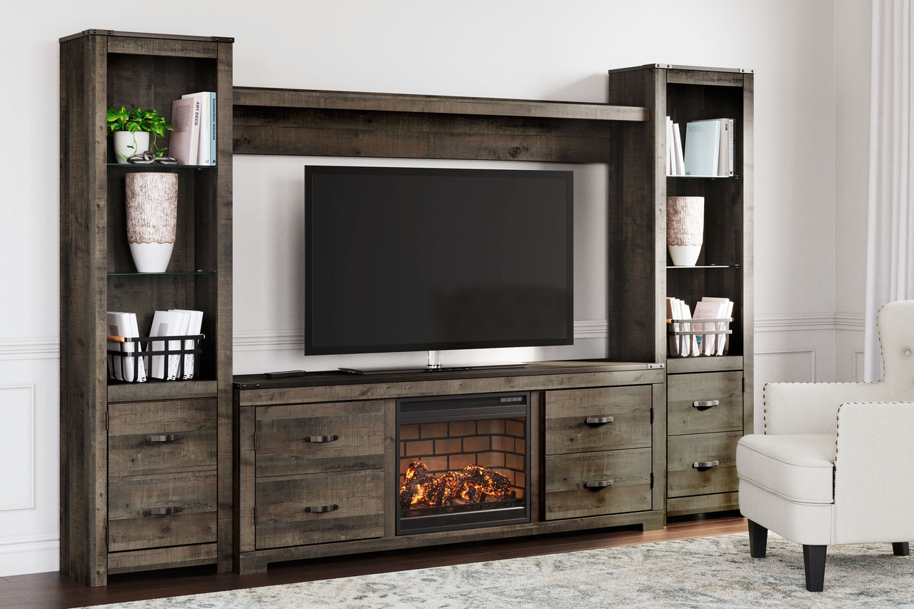 Trinell - Brown - 4-Piece Entertainment Center With Faux Firebrick Fireplace Insert Tony's Home Furnishings Furniture. Beds. Dressers. Sofas.