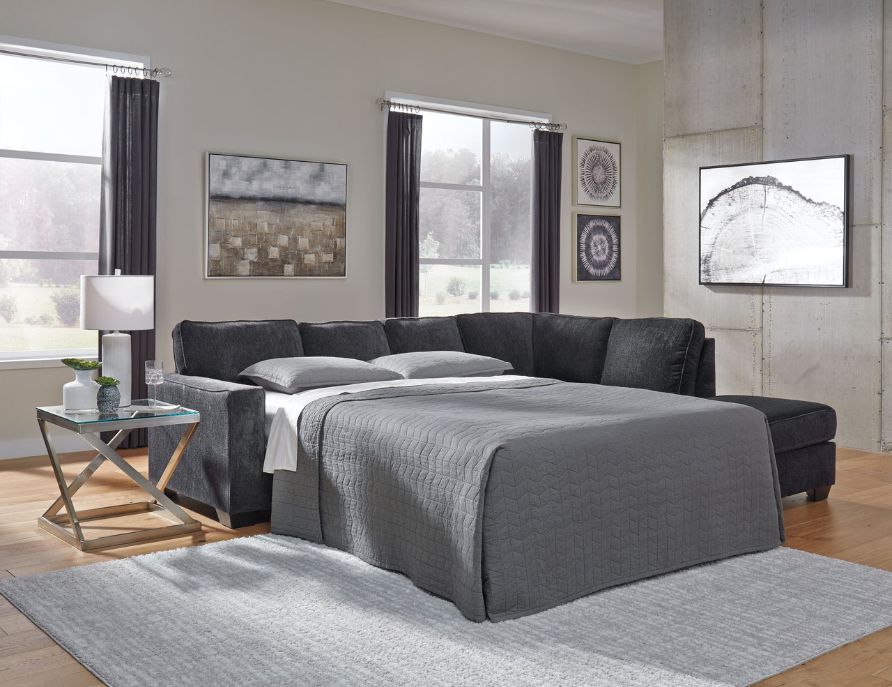 Altari - Sleeper Sectional Tony's Home Furnishings Furniture. Beds. Dressers. Sofas.