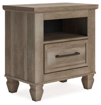 Thumbnail for Yarbeck - Sand - One Drawer Night Stand Tony's Home Furnishings Furniture. Beds. Dressers. Sofas.